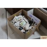 A box of cigarette cards