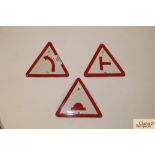 Three small enamel triangular road signs, previous