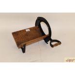A Raadvad iron and wooden mounted herb cutter