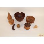 Three turned wooden bowls; an oak tea caddy and various t