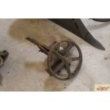 Part of a vintage single wheel seed drill