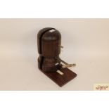 A vintage patent wooden hat stretcher