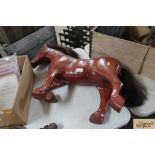 A wooden painted model of a horse