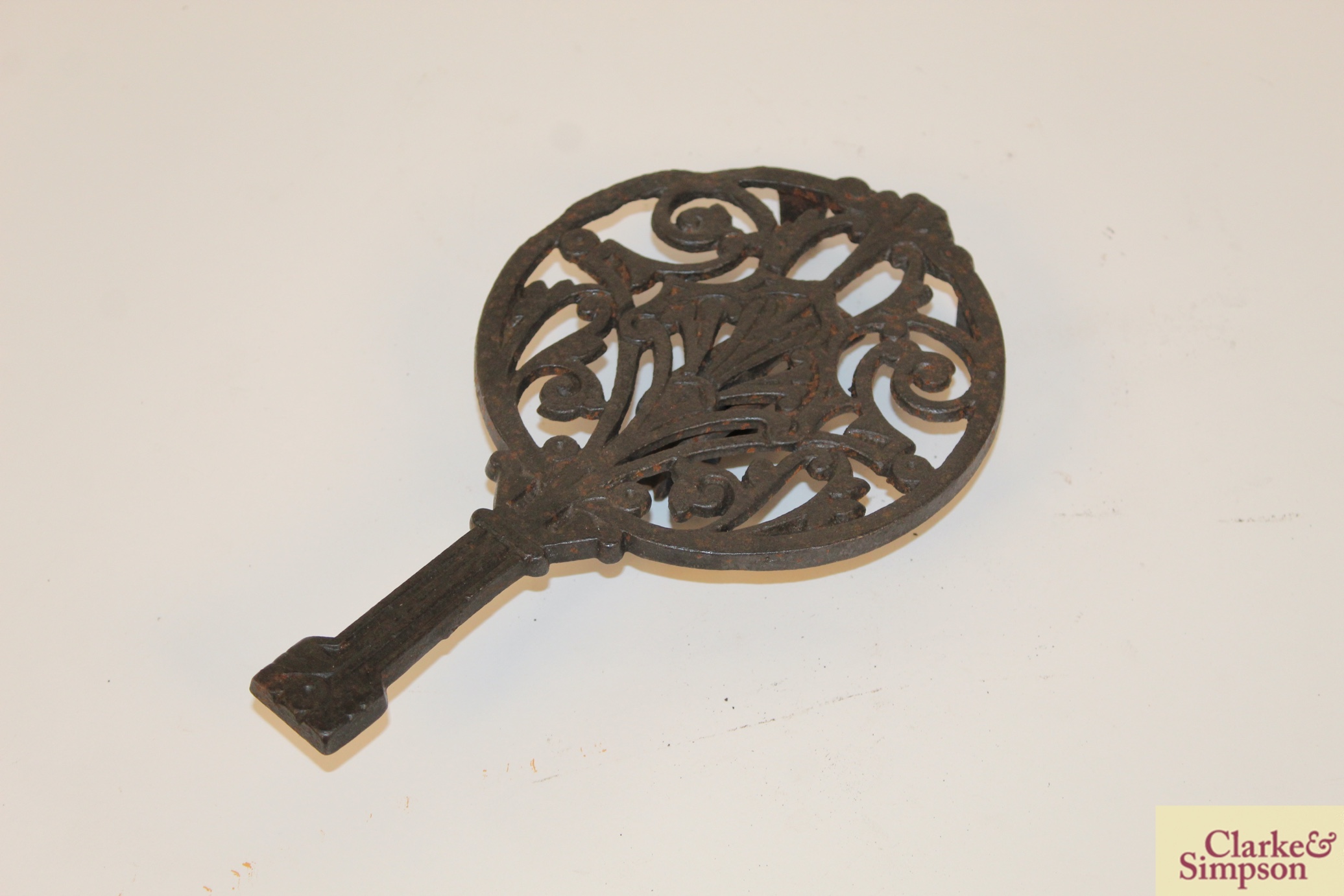 Four various ornate cast iron trivets; two flat ir - Image 13 of 20