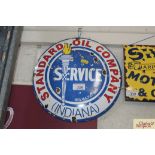 A Standard Oil Co. (Indiana) circular enamel sign,