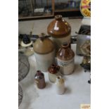 A quantity of stoneware bottles including two gall
