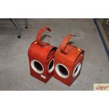 Two vintage red road warning lamps