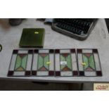 Four coloured glass leaded light panels and four g