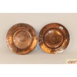A pair of Middle Eastern copper and tin ware shall