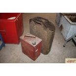 A vintage Jerry can and a red fuel can