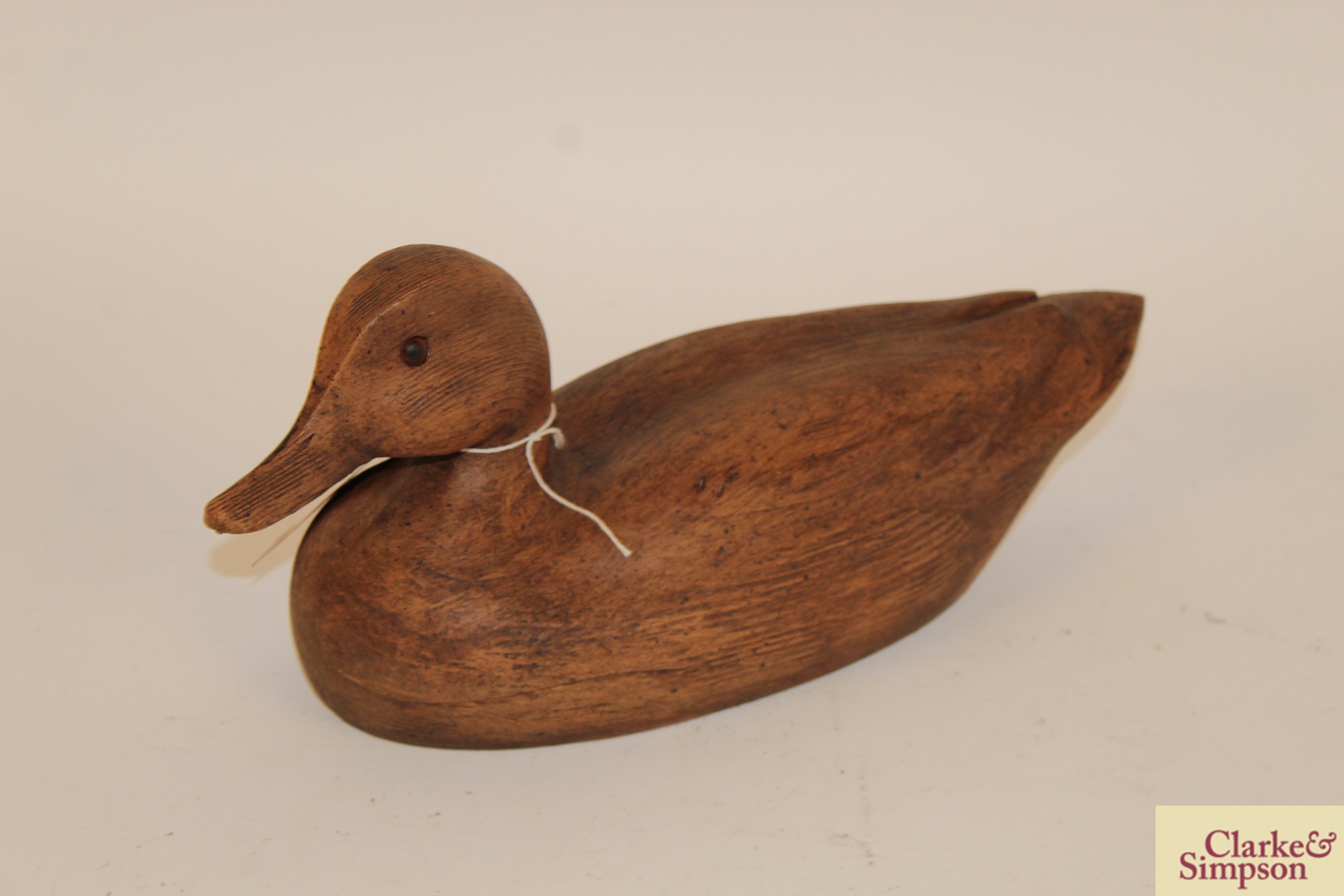 An old wooden decoy duck
