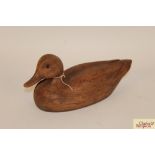 An old wooden decoy duck