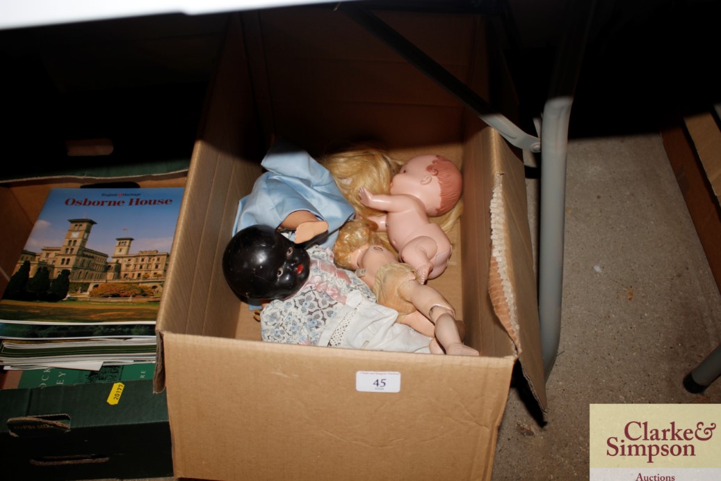 A box of various dolls to include an Armande Marsi