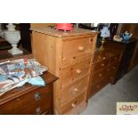 A stripped pine chest fitted with four long drawers;