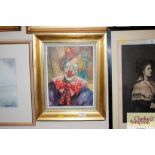 A gilt framed oil on canvas portrait study of a clown signed bottom right