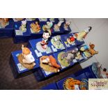 Nine Royal Doulton showcase collection figurines with original boxes