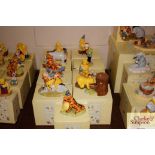 Nine boxed Royal Doulton Winnie the Pooh collection figurines