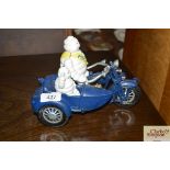 A reproduction Michelin Man, motorbike and sidecar