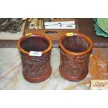 A pair of oriental resin brush pots