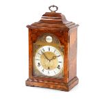 A burr walnut cased mantel clock, having chiming movement by Mallory of Bath, the brass and silvered