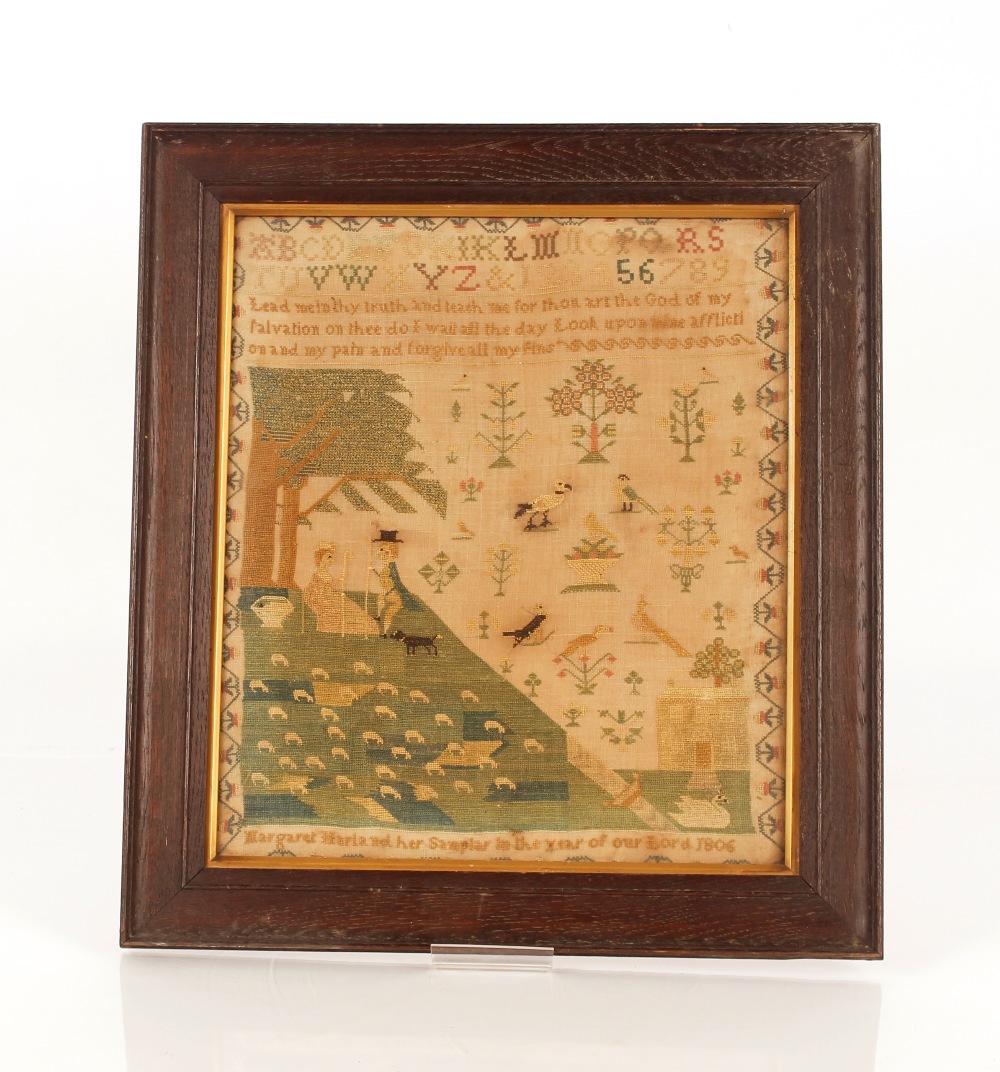 A 19th Century sampler, decorated with alphabet, n