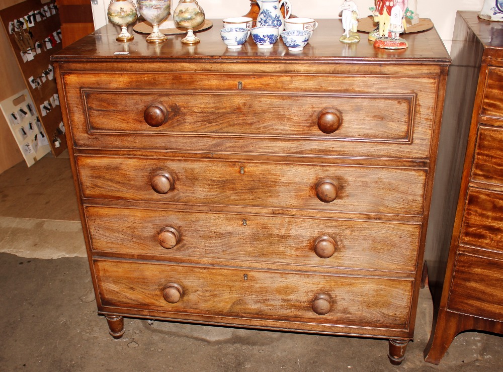 A 19th Century mahogany and cross banded secretaire chest, the writing drawer with interior