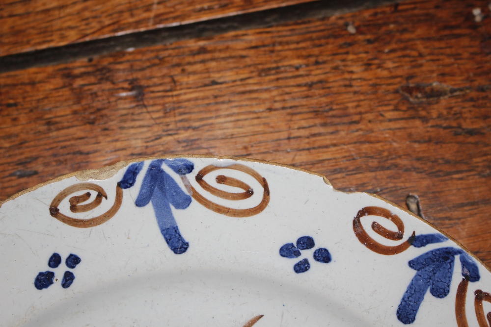 A rare early 18th Century English Delftware dish, painted with a stylised hare with a squirrels - Image 3 of 7