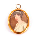 Mid 19th Century portrait miniature of a young lady, bust length in oval frame, 6cmx 5cm; together