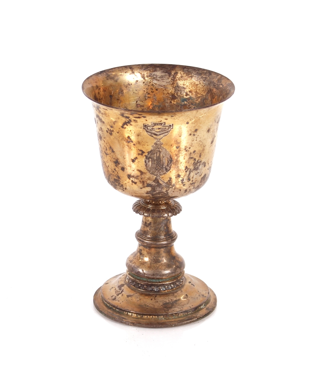 A 20th Century silver gilt Masonic chalice, with engraved decoration 2397 Columbia, 15.5cm high, 9oz