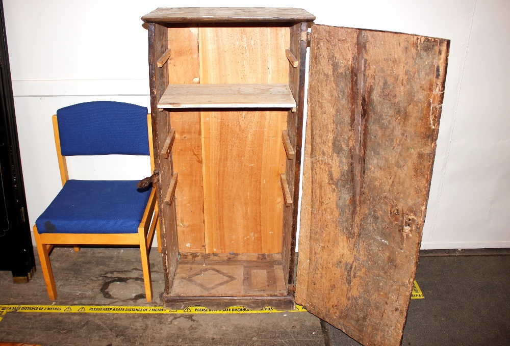 An unusual antique oak narrow storage cupboard, enclosed by a single carved door decorated metal - Image 2 of 2