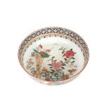 A famille rose Canton bowl, painted scroll mark to base, 24.5cm dia.