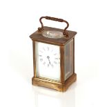 A brass cased carriage timepiece, 13cm high overall