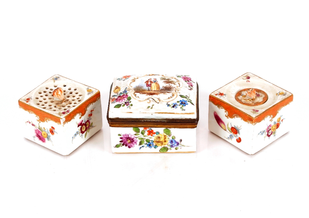 A continental porcelain hinged box and cover, decorated foliate sprays, the lid with central