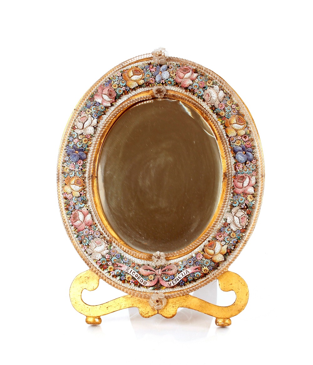 A 19th Century Venetian glass and micro mosaic easel mirror, raised on a gilt scroll base, 49cm x