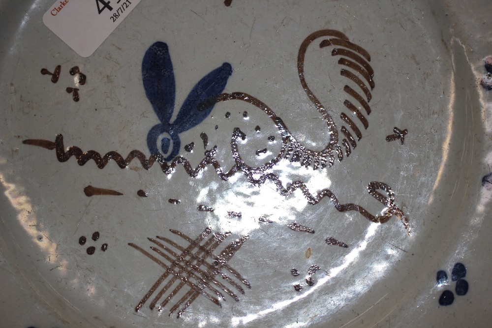 A rare early 18th Century English Delftware dish, painted with a stylised hare with a squirrels - Image 5 of 7