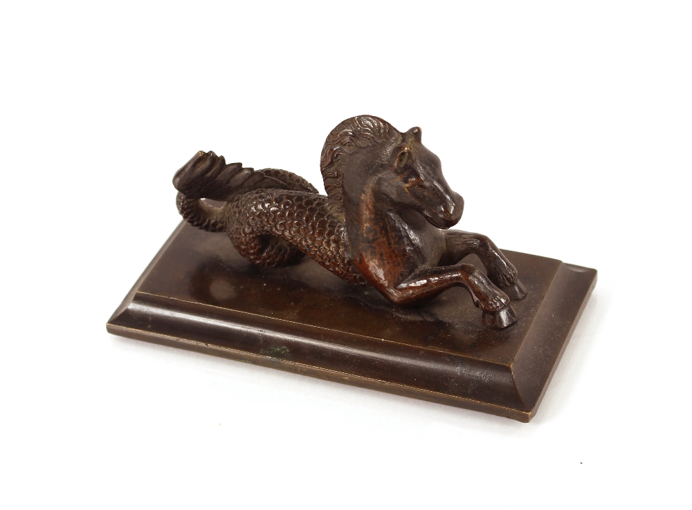 A 19th Century bronze mythical horse figure, on platform plinth, 12.5cm long overall