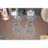 A pair of cut glass decanters and stoppers