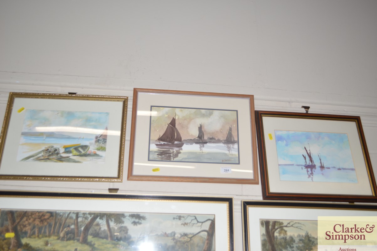 Three watercolour studies depicting boats