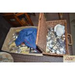 A box and a wicker basket of various silver plated