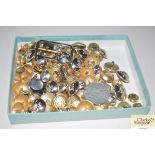 A box of various military buttons etc.