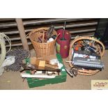 Two wicker baskets; a box; and a paper bin with co