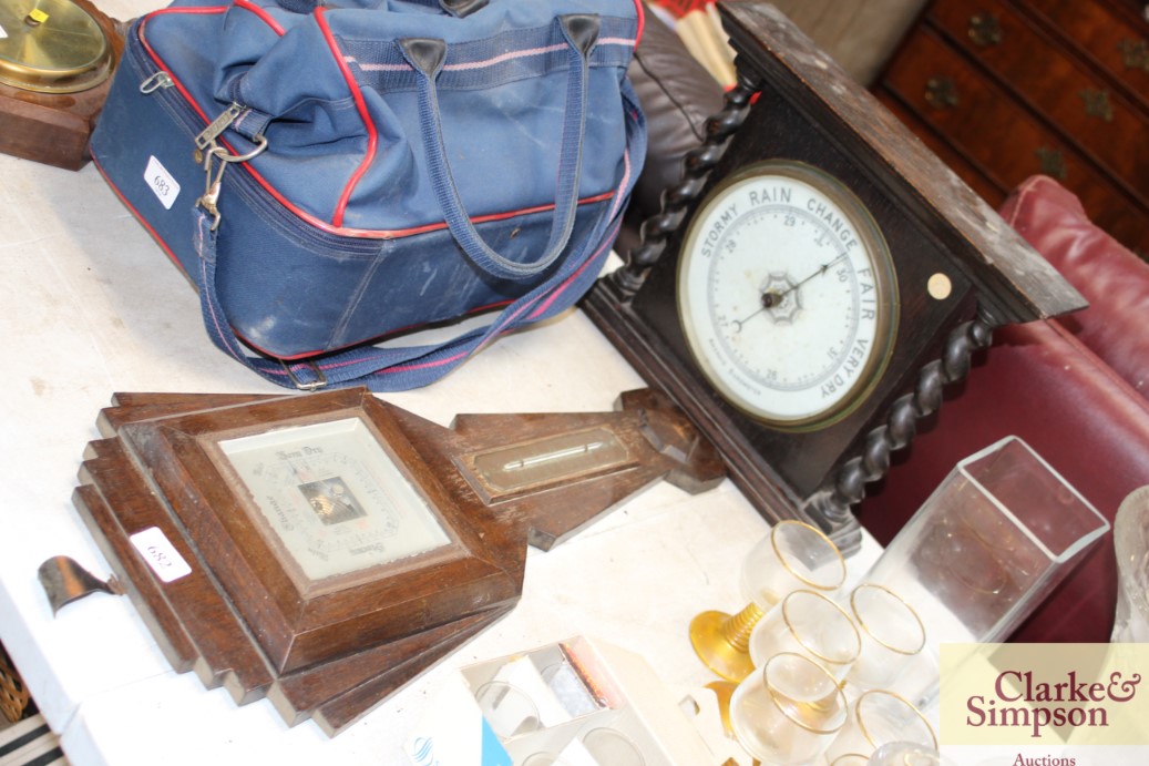 An Art Deco barometer and a aneroid barometer with