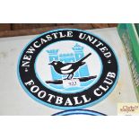 A reproduction Newcastle United football plaque