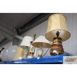 Four various table lamps and shades