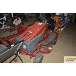 A Lawn Master Honda engine ride-on lawn mower with