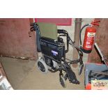 A mobility walker and a folding wheelchair