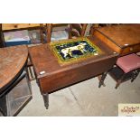 A Victorian mahogany drop leaf table