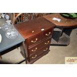 A mahogany chest of three drawers