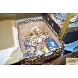 A box of various costume jewellery