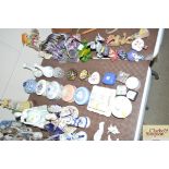 A quantity of various decorative porcelain boxes,